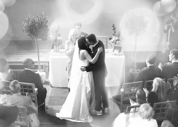 Bride and groom first kiss