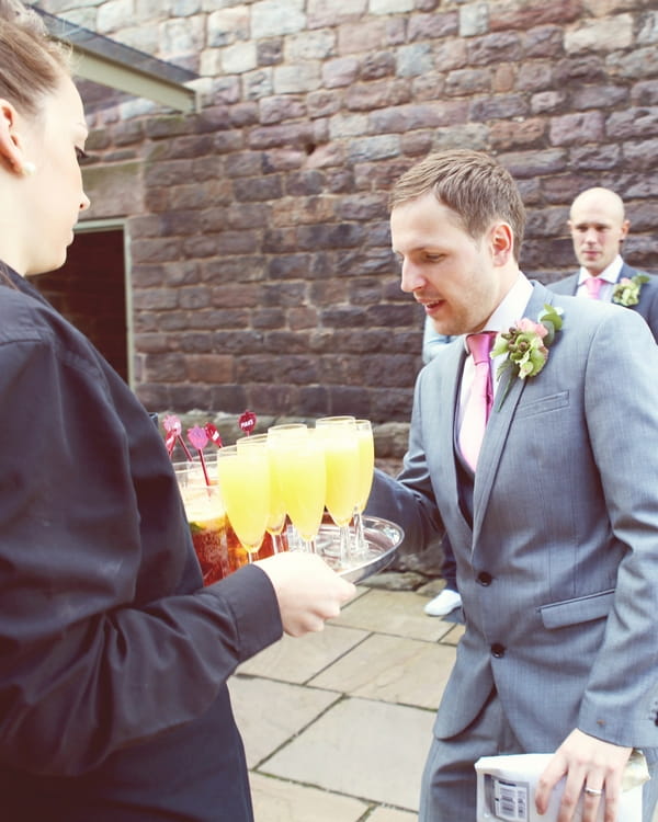 Wedding guest taking drink