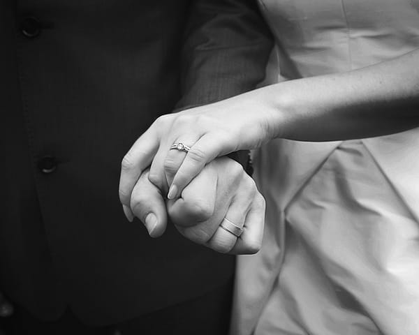 Bride and groom's hands