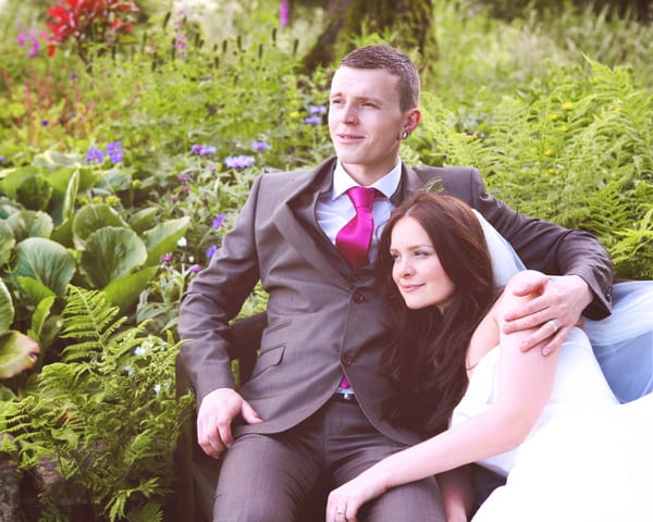 Bride leaning on groom