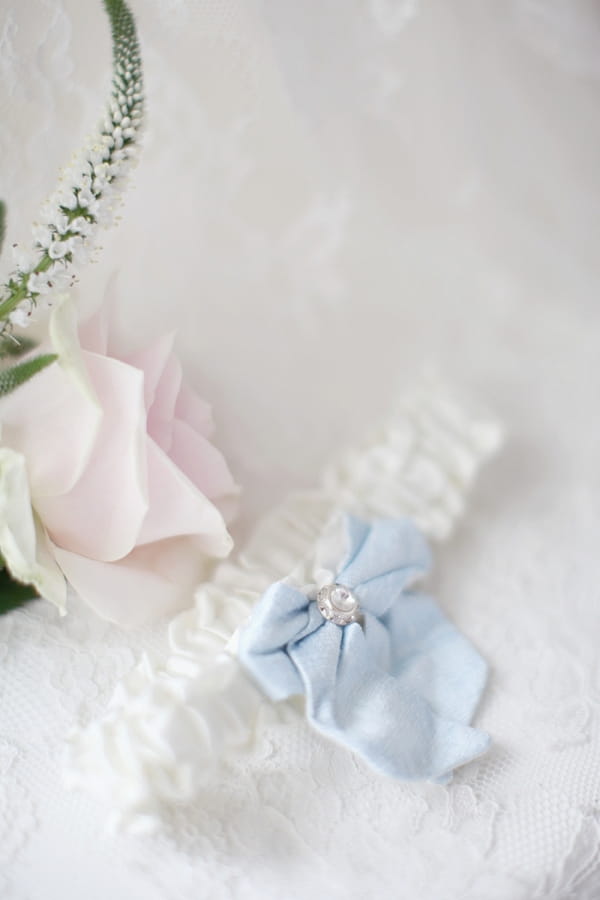 Wedding garter with blue bow