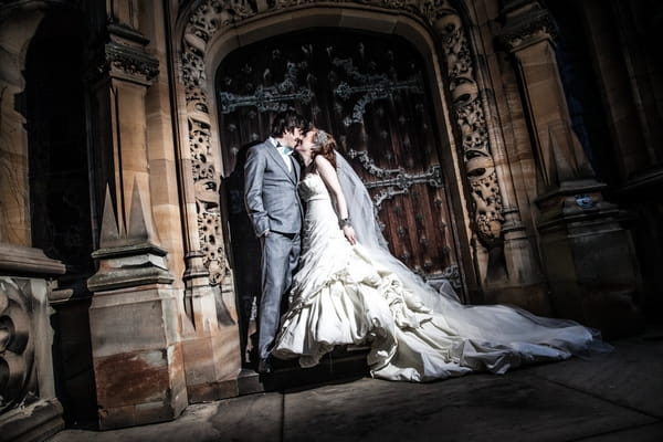 Bride and groom in doorway