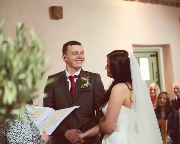 Bride and groom at altar