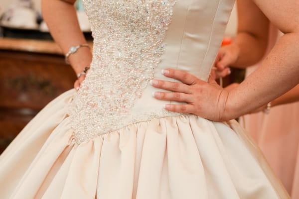 Detail on front of bride's dress