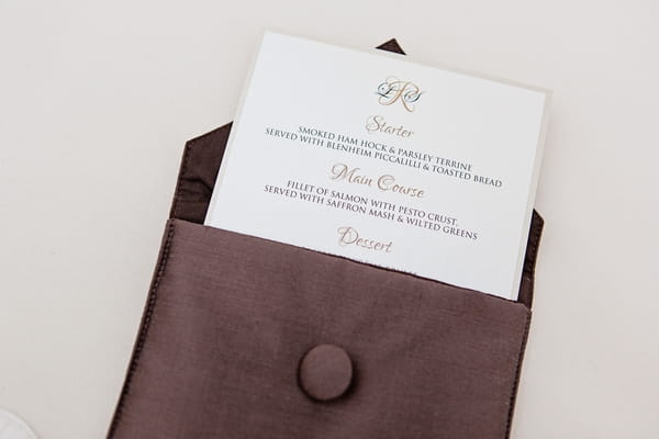 Wedding menu in brown case