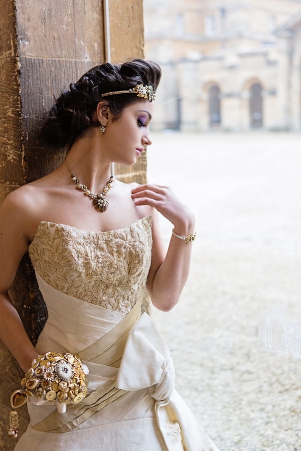 Bride with gold detailed wedding dress