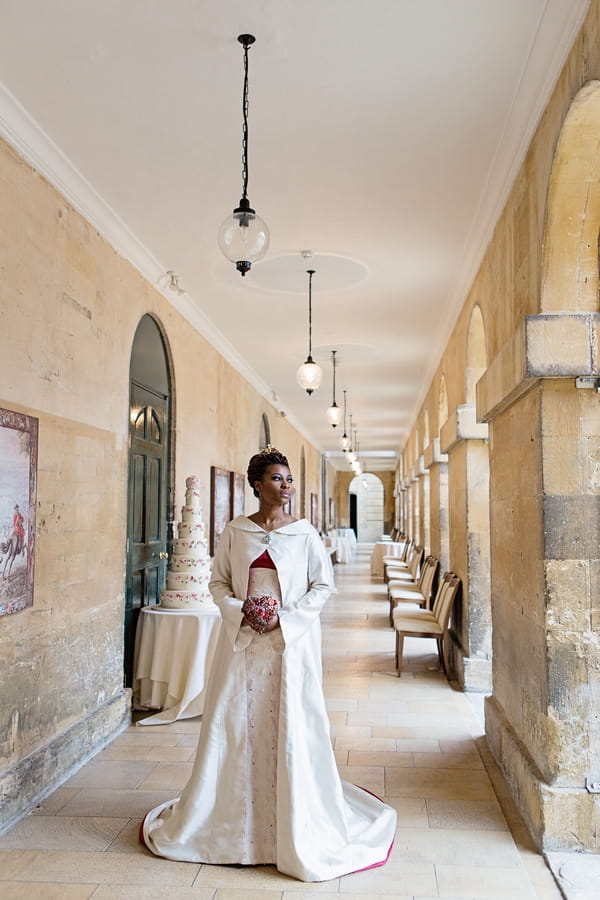 Bride standing in corridor