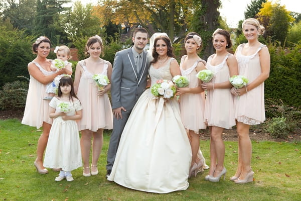 Bride and groom with bridesmaids