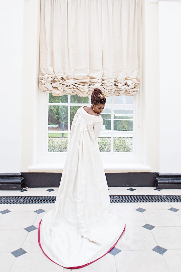 Back of bride's long wedding coat