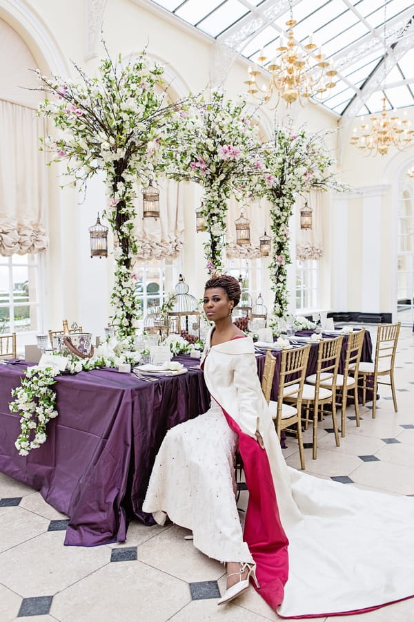 Bride sitting at wedding table