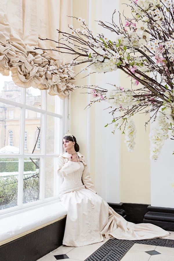 Bride stting on windowsill