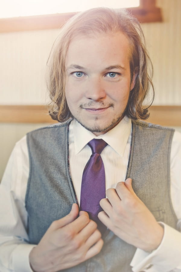 Groom with purple tie