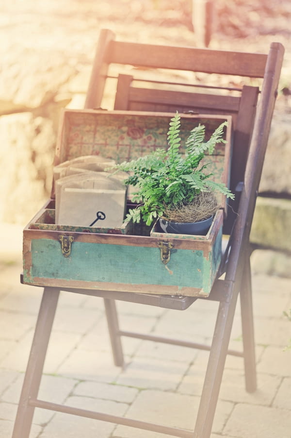 Chair with box of wedding stationery