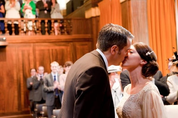 Bride and groom kiss