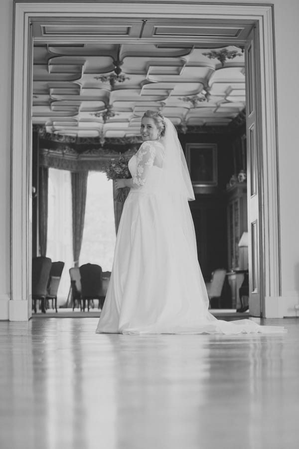 Bride looking over shoulder