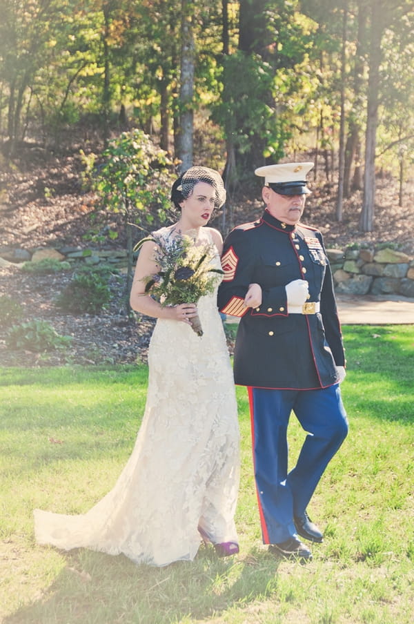 Bride walking with father