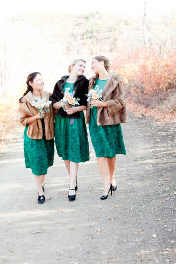Bridesmaids walking in fur coats