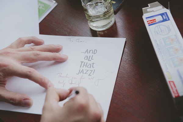 Groom writing card