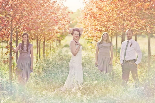 Bride with best man and bridesmaids