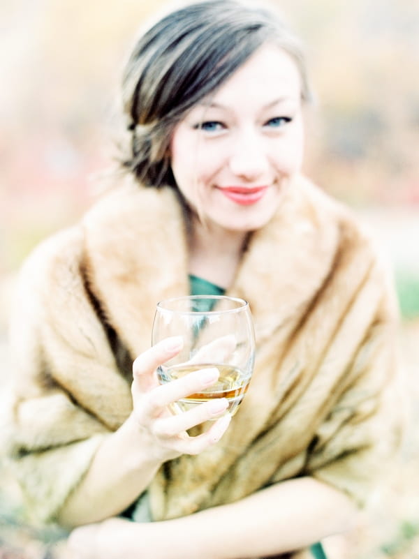 Bridesmaid in fur with whisky