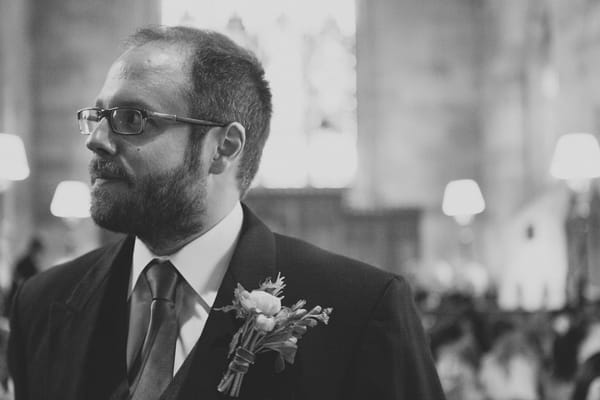 Groom waiting at altar