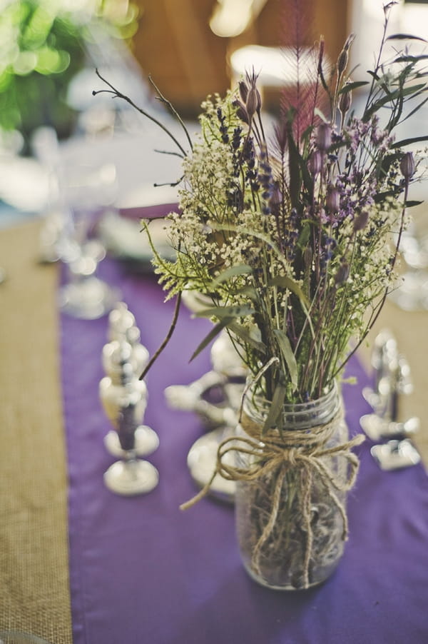 Jam jar of lavender on wedding table