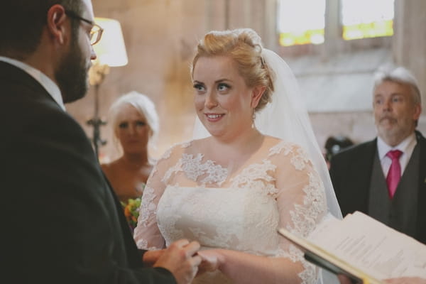 Bride and groom saying vows