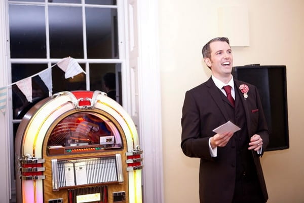 Groom speech next to juke box