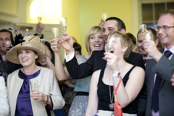 Wedding guests laughing