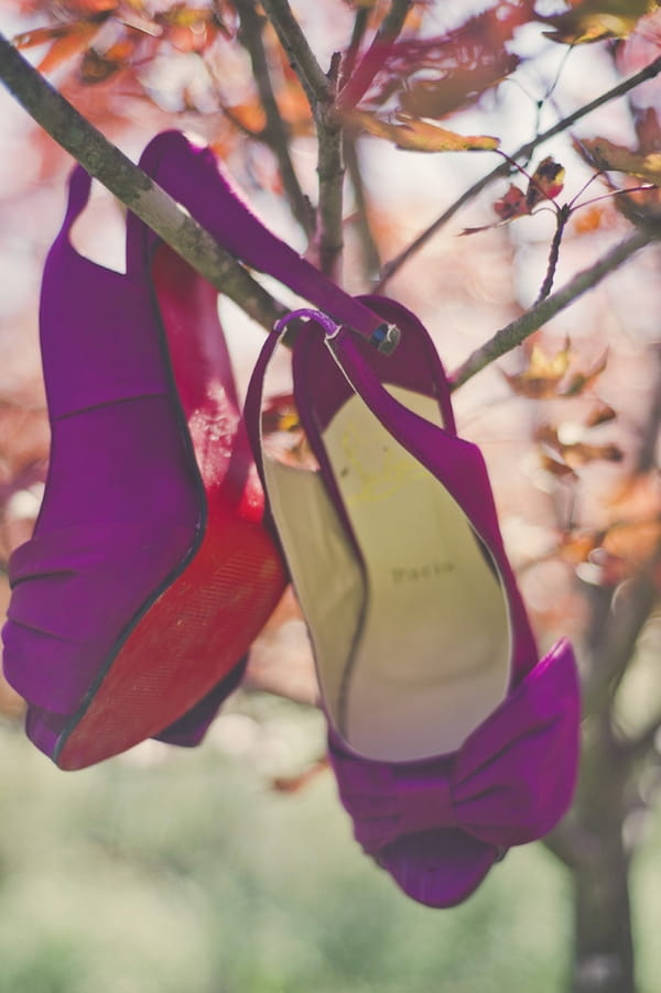 Purple wedding shoes in tree