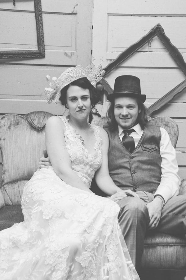 Bride and groom posing in photo booth