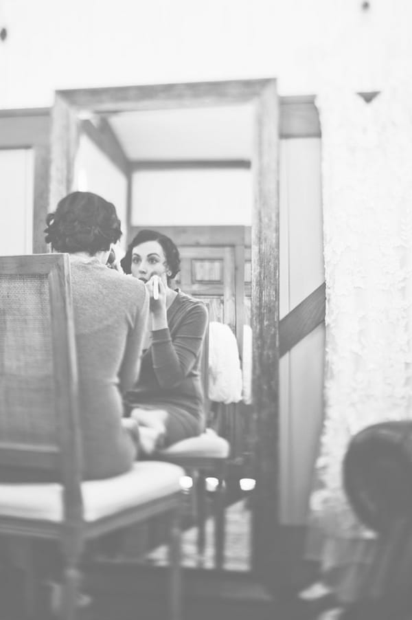 Bride putting on make-up