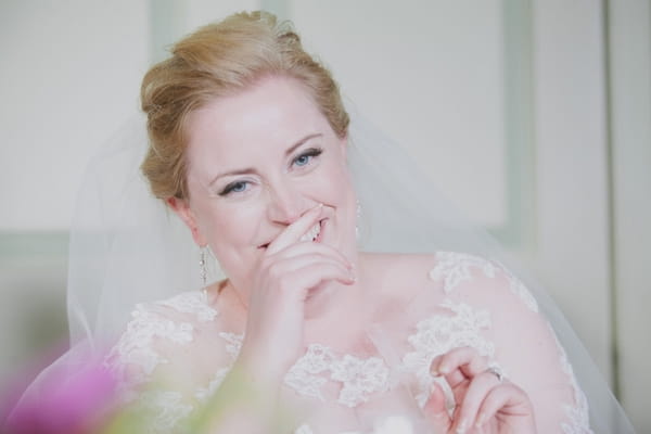 Bride laughing at speech