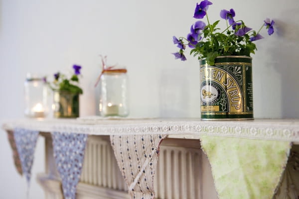 Golden syrup tin used as vintage wedding plant pot