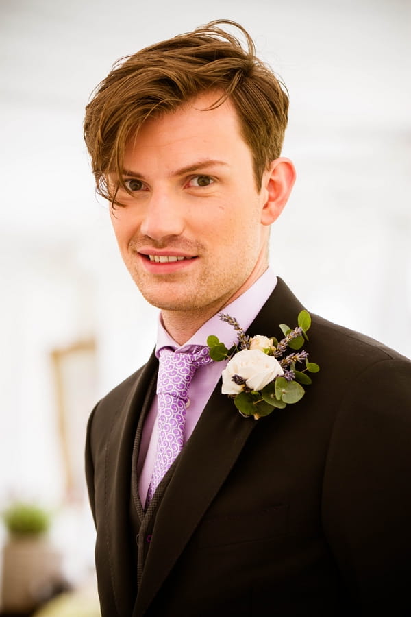 Groom with purple tie