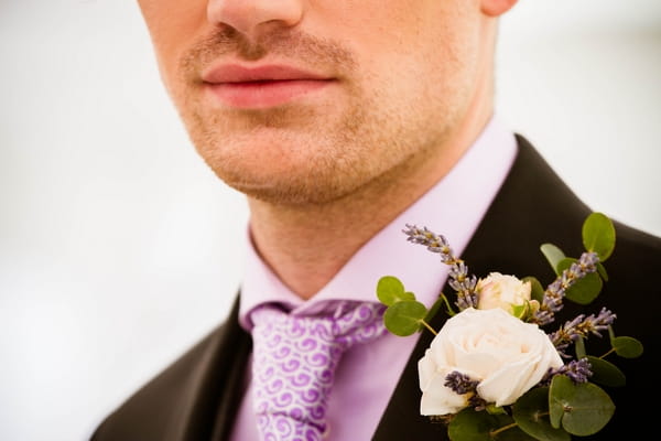 Groom's purple shirt and tie