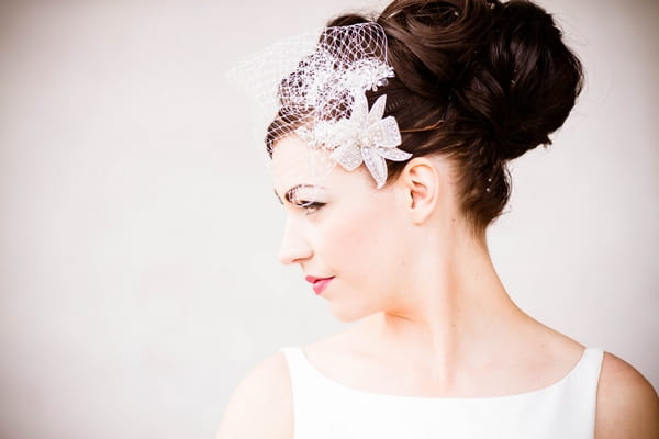 Bride with fascinator and bow hairpiece