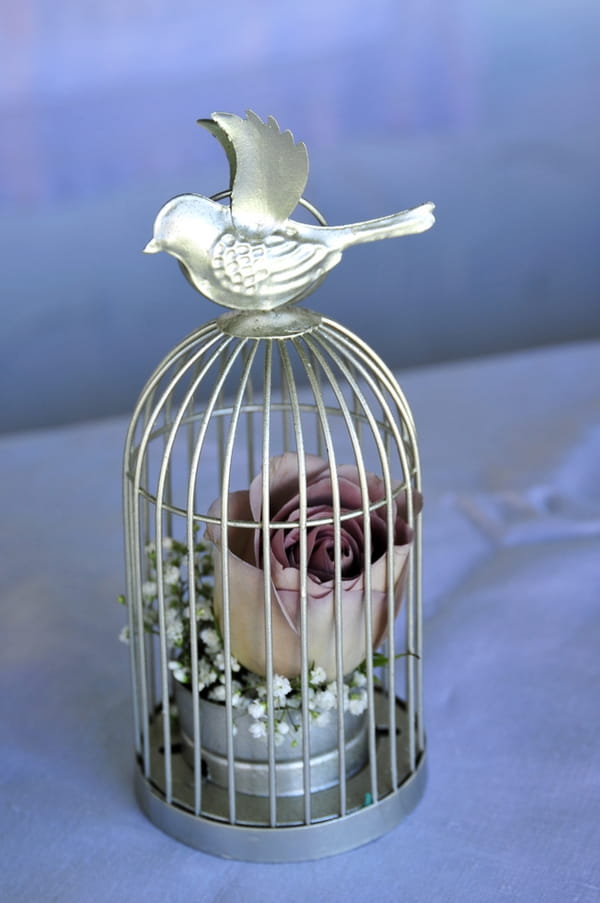 Birdcage with rose
