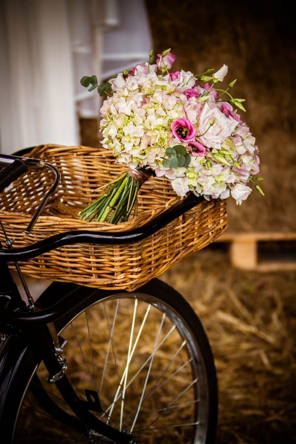 Wedding bouquet in bicycle basket