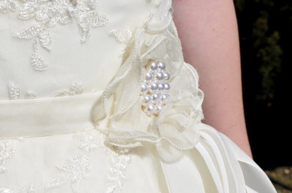 Flower on bride's dress