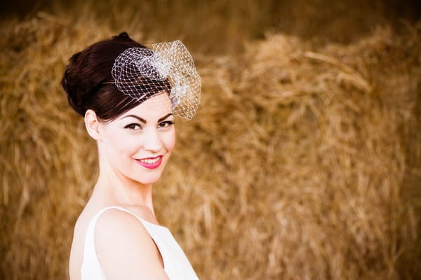 Vintage bride with birdcage fascinator