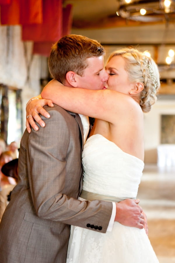 Bride and groom kiss