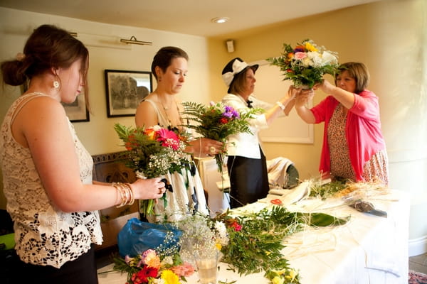 Wedding flowers being arranged