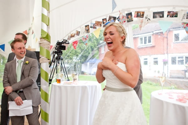 Bride laughing at speech