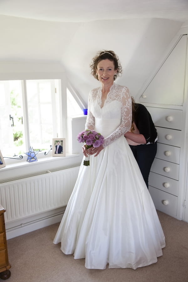 Bride in lace wedding dress