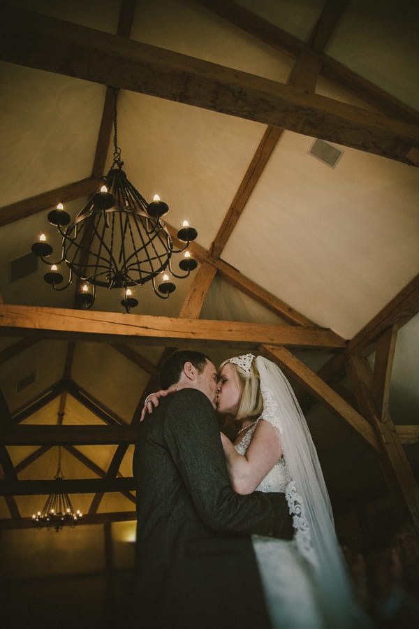 Bride and groom kiss