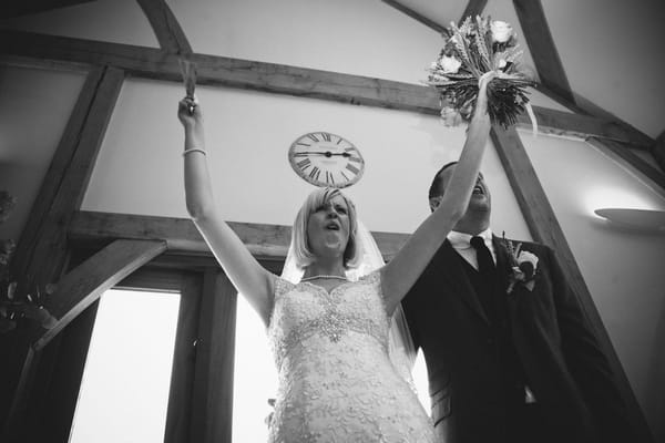 Bride with arms in the air