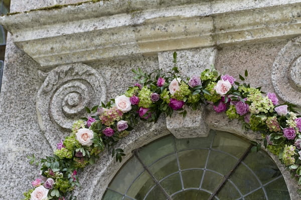 Flowers around top of church window