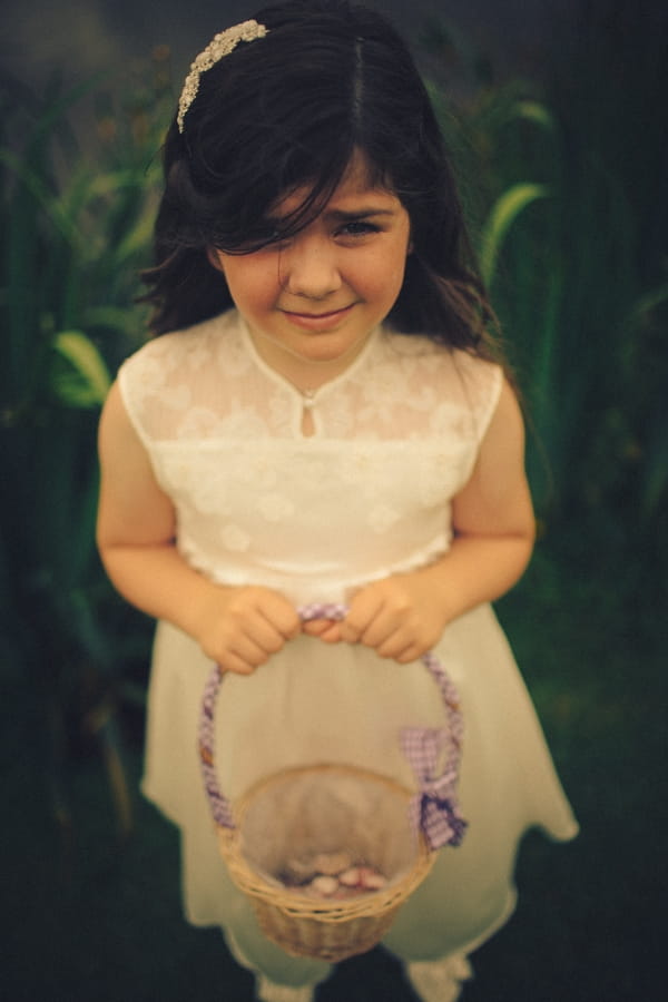 Flower girl holding basket