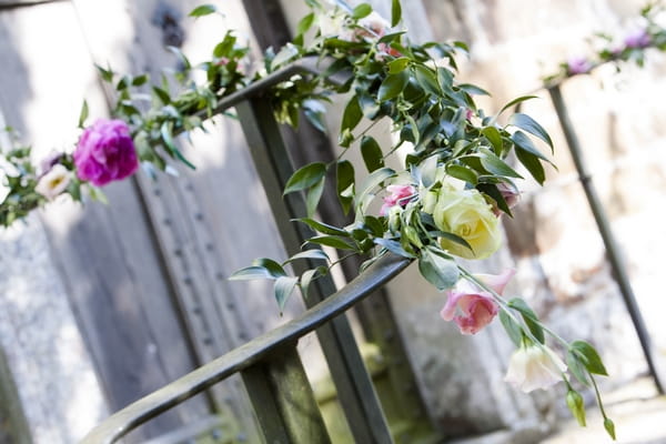 Flowers around church railings